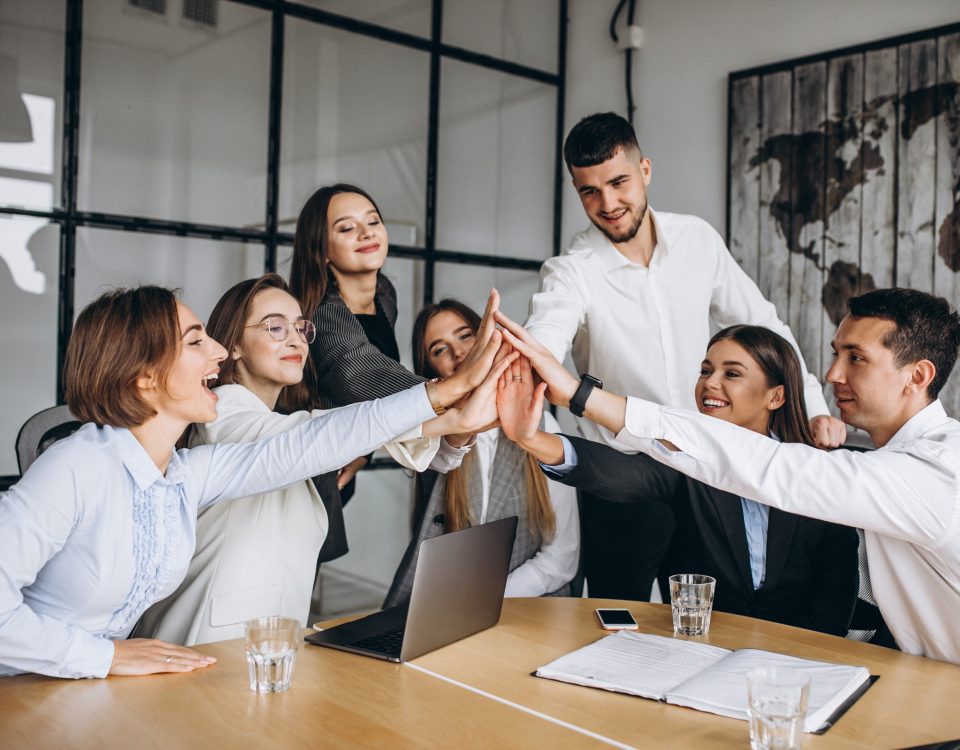 group of people working out business plan in an office